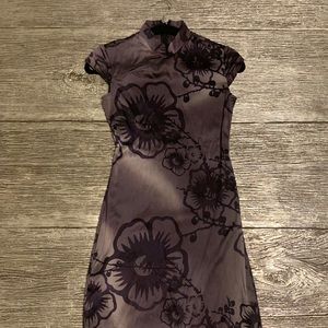 Dress . Brand Guess Size 4 purple and black .